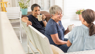 older women laughing together