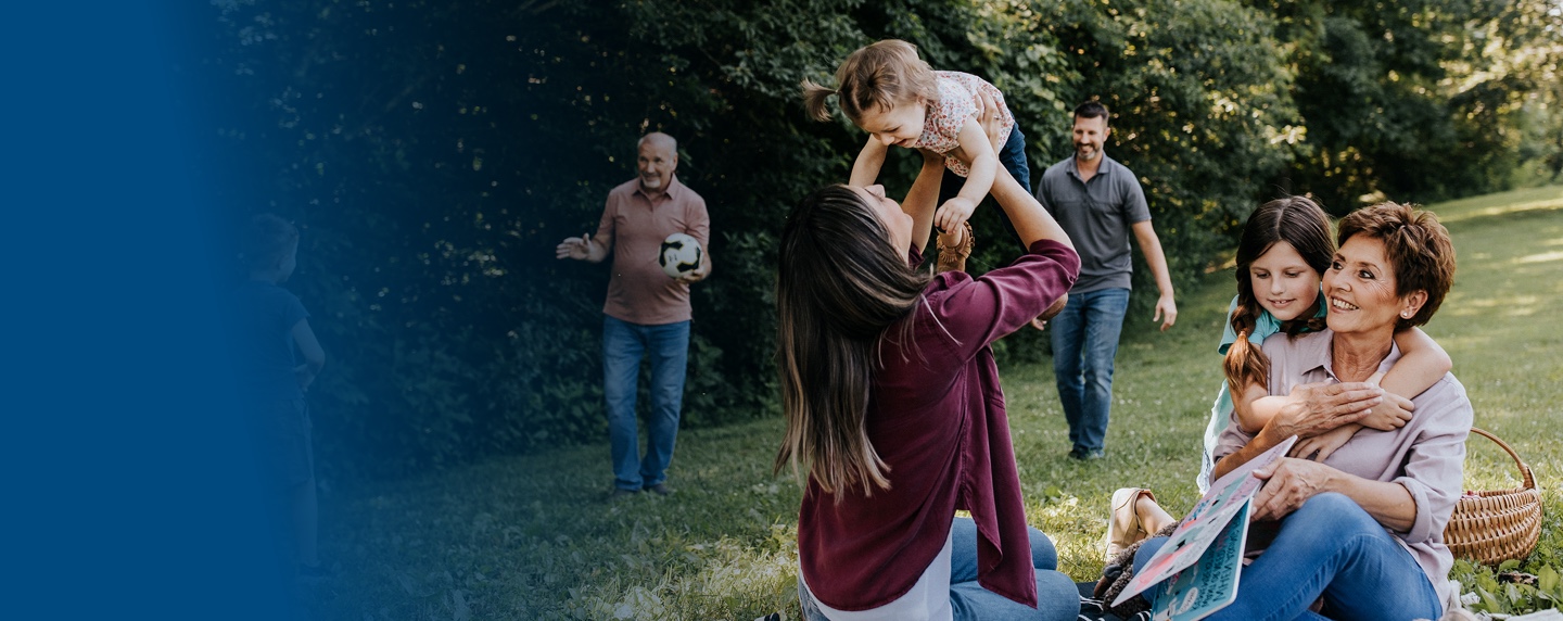 family playing in that grass