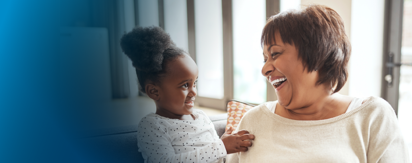  Grandmother laughing with her young granddaughter | BCBS of Tennessee