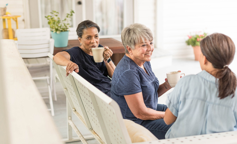 older women laughing together